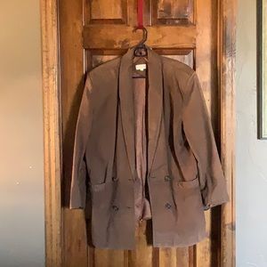 Women’s large brown leather blazer. Very good condition.